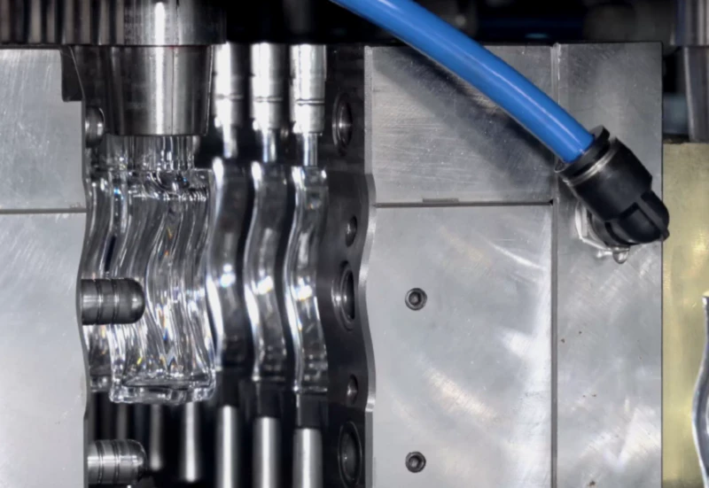 Injection stretch blow molding mold and tooling close-up